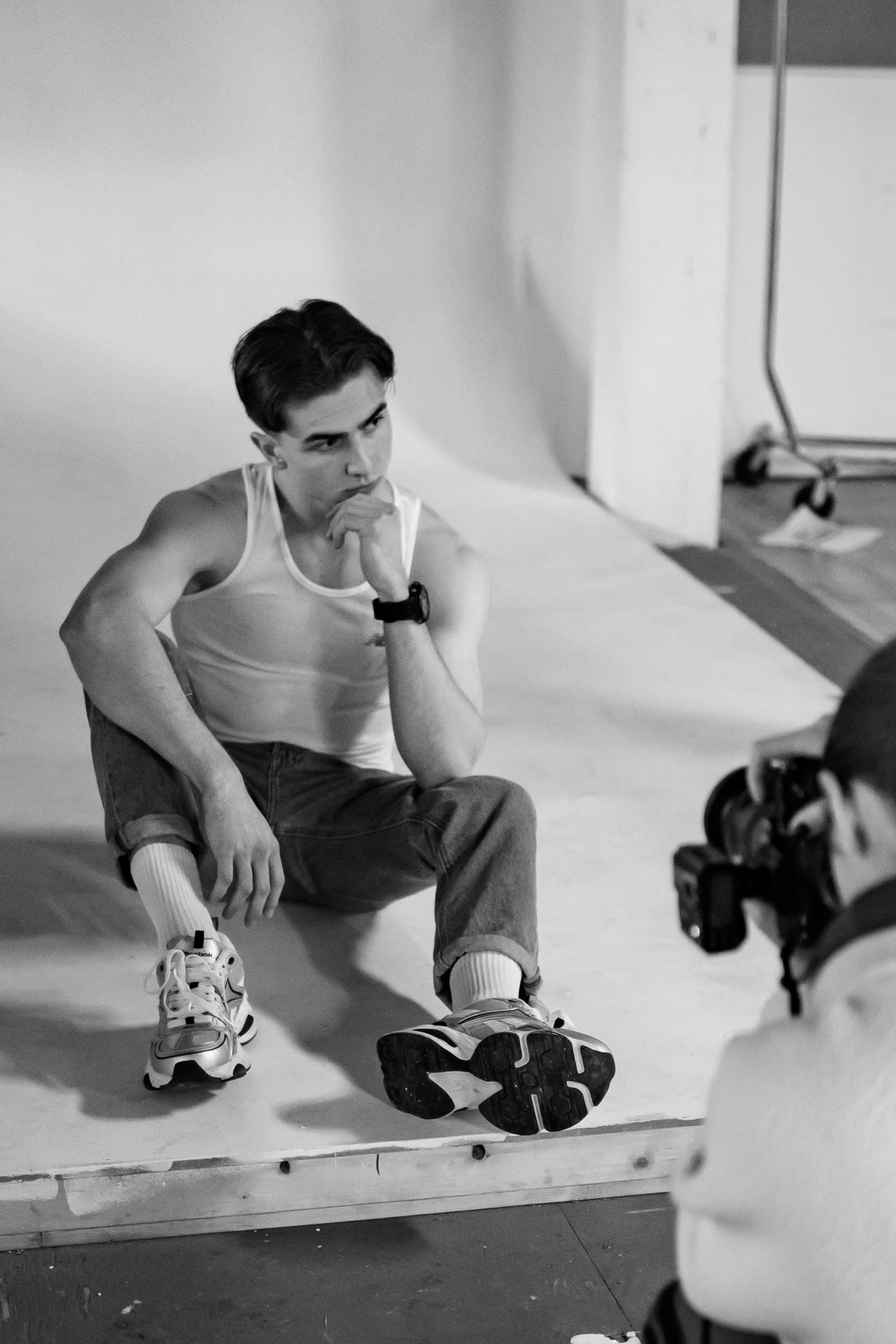 Sergio Alexo on set, black-and-white studio session